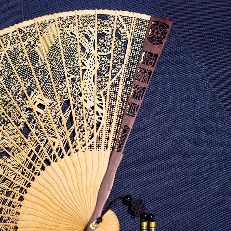 Chinese Sandalwood Fan - 7-inch Burmese incense wood hollowed-out carved folding fan, Chinese-style gift fan
